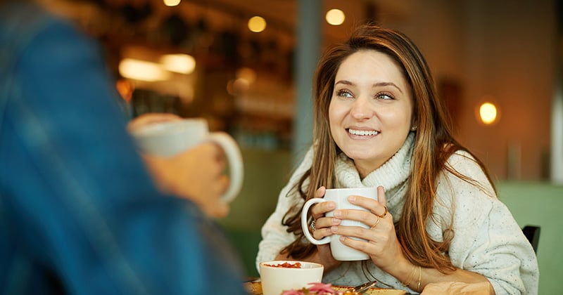 Friends enjoying coffee at First Watch